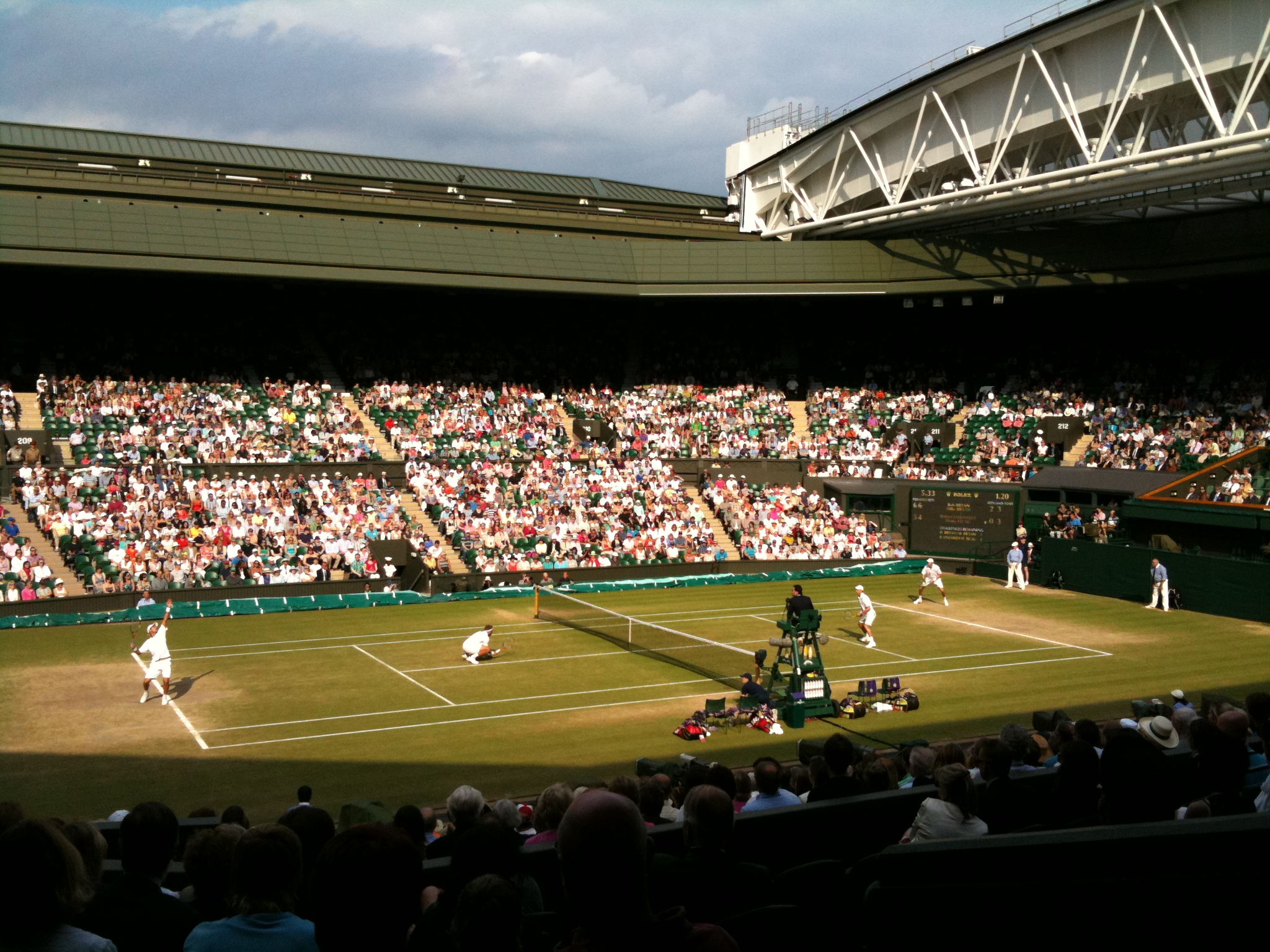 Bob and Mike Bryan playing Robert Lindstedt and Horia Tecau in the 2011 Wimbledon men's doubles final