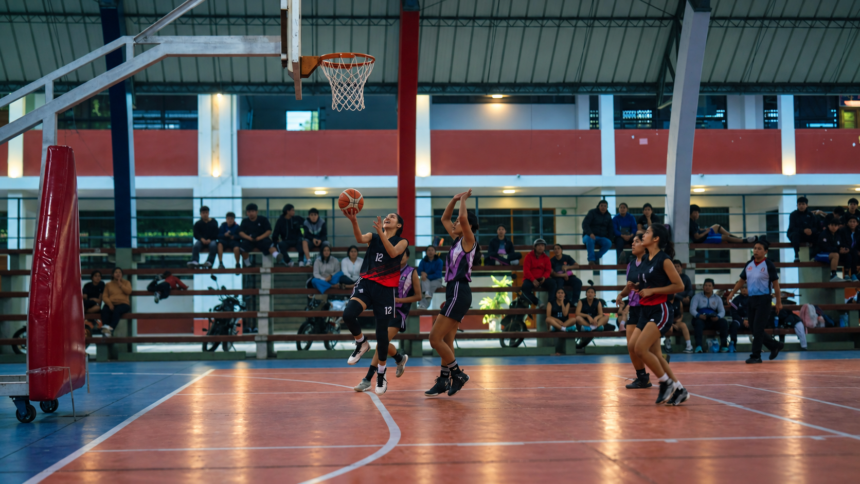 A basketball match in a crowded arena