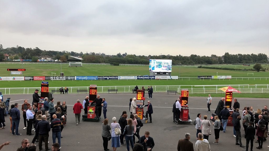 Bookmakers and racegoers at Leicester Racecourse in September 2018